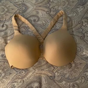 Spanx front closure size 42D. Never worn